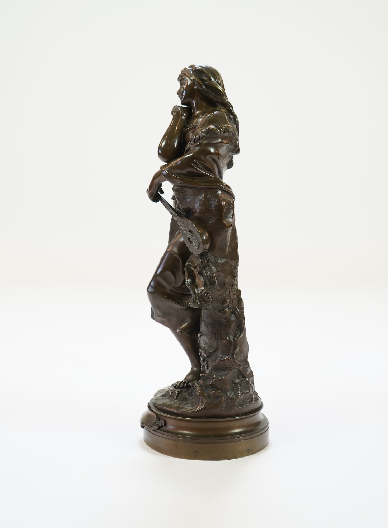 Adrien Etienne Gaudez (1845-1902), ‘Mignon’, a patinated bronze figure of peasant girl with a mandolin
